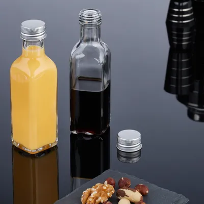 Produktbild von Relaxdays kleine Flaschen, 16er Set, 100 ml, Glasflaschen zum Befüllen, Schraubverschluss & Korken, transparent/silber