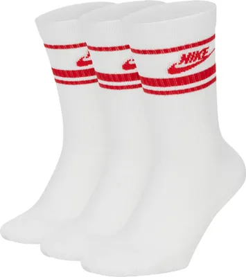 Three pairs of white crew socks with red stripes and Nike logos on the cuff.