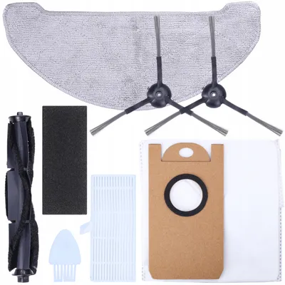 A collection of vacuum cleaner accessories laid out on a white background.