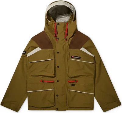 Wasserdichte Trango Gore-Tex Jacke von Berghaus in Olivgrün mit mehreren Taschen und Kapuze.