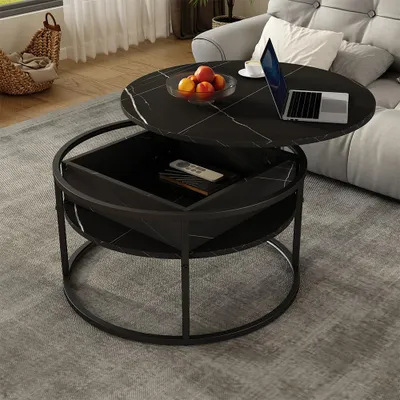 A modern living room setting with a black marble-effect coffee table.