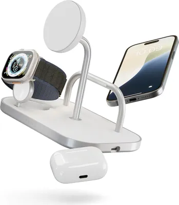 A white and silver 4-in-1 wireless charging station with an Apple Watch, iPhone, and AirPods charging.