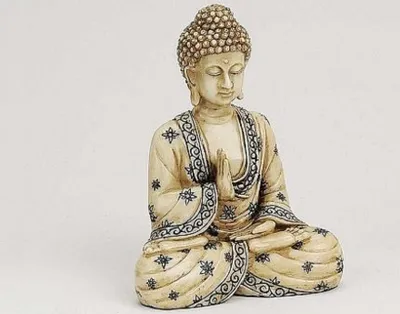 A statue of Buddha sitting in meditation.