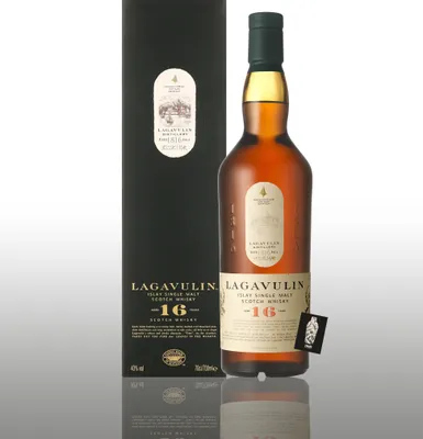 A bottle of Lagavulin Islay Single Malt Scotch Whisky and its gift box are displayed against a white and gray background with reflections.
