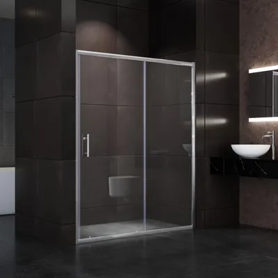 A modern bathroom with a glass shower door.