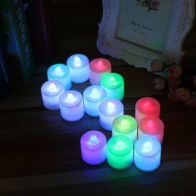 Produktbild von LED-Lichterketten ohne Flamme, batteriebetrieben, mit einem langsamen Flicker-Effekt in sieben Farben, geeignet für Innendekoration, Tischdekoration, Halloween und Weihnachten, Verpackung mit 24 Lichterketten.