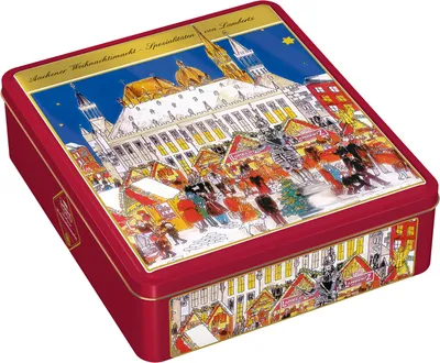 A red tin box decorated with a Christmas market scene, featuring buildings, stalls, and people.