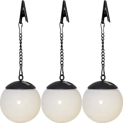 Three solar-powered LED globe lights hanging from chains with clips.
