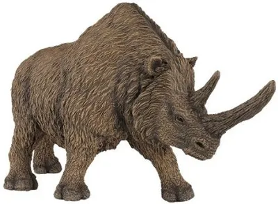 A brown, furry rhinoceros figurine is shown against a white background.