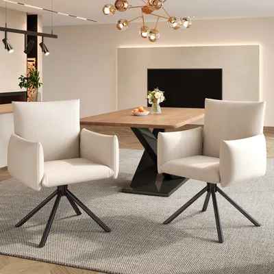 A dining room setting with two chairs and a table.