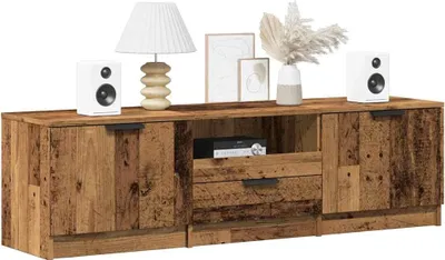 A TV stand with decorative items on top, presented against a white background.