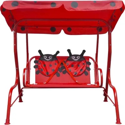 A red ladybug-themed children's swing set with a canopy.