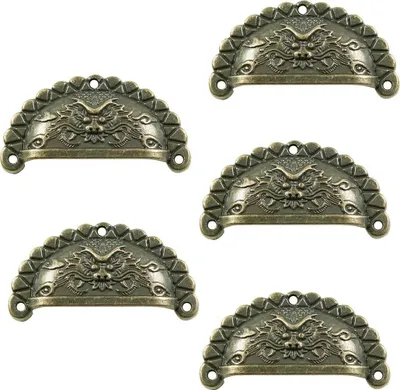 A collage of five drawer pulls with a dragon design.