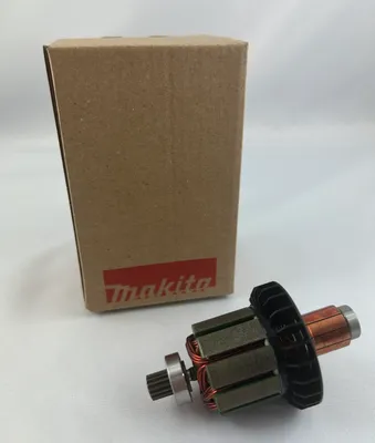 A product shot of a Makita motor armature and its original packaging.