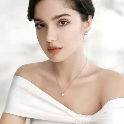 Image de Ensemble de bijoux en argent sterling 925, comprenant un collier et des boucles d'oreilles ornés de perles, idéal pour un mariage