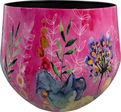 A close-up of a decorative pot with a floral design.