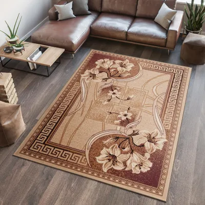 A living room scene with a sectional sofa, coffee table, and a rug.