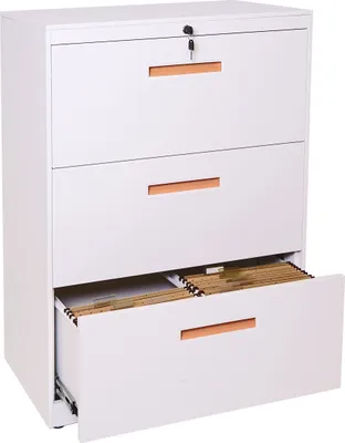 A white metal filing cabinet with three drawers, one of which is open and contains hanging files. The handles on the drawers are a light brown color. A key is in the lock on the top drawer.