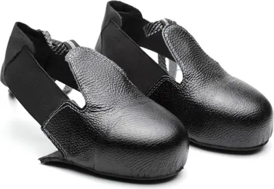 A pair of black safety overshoes with steel toes.