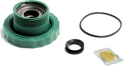 A set of washing machine spare parts, including a green cap with a metal insert, a black rubber ring, and a black O-ring, laid out on a white background.