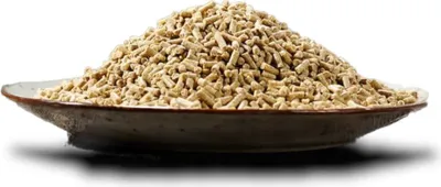 A pile of light brown pellets in a shallow bowl.