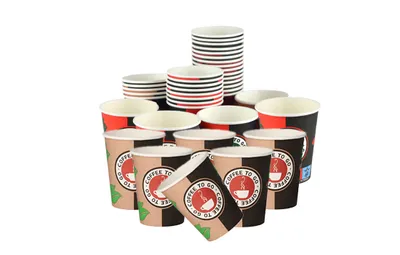 A collection of disposable coffee cups stacked and arranged.