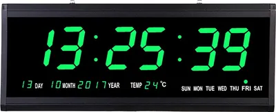 A digital clock displaying the time, date, temperature, and day of the week.