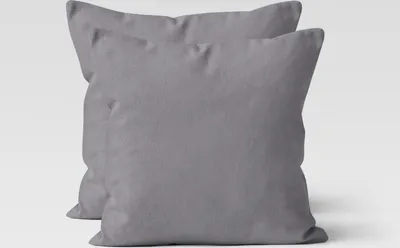 Two grey pillowcases are shown against a white background.
