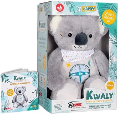 A koala plush toy in its packaging, with a manual next to it.
