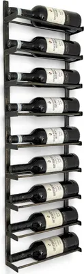 A wall-mounted metal wine rack holding multiple bottles of red wine.