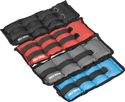 Four sets of weighted cuffs in different colors are neatly arranged.