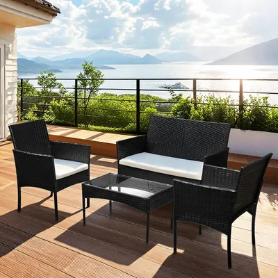 Produktbild von Ikodm 4-teiliges Polyrattan-Gartenmöbel-Set mit 2 Sesseln, Sofa, Glastisch und Kissen, Schwarz