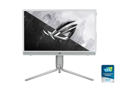 A white ASUS gaming monitor with a silver tripod stand is shown against a white background. The monitor screen displays a black and white graphic with the ROG logo. A CES Innovation Awards 2021 badge is in the bottom right corner.
