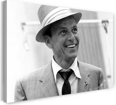 Produktbild von Leinwandbild (80x60cm): Frank Sinatra mit breitem Lächeln im Gesicht und Hut, echter Holz-Keilrahmen inkl. Aufhänger, handgefertigt in Deutschland