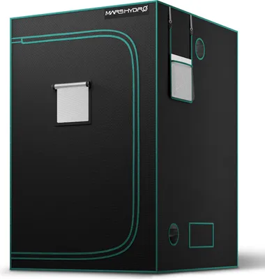 A black grow tent with green trim, shown from a slight angle against a white background.