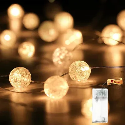 Imagen del producto de Guirnalda de luces con bolas de cristal, luz cálida, 2 metros, 20 LEDs, para uso interior y exterior