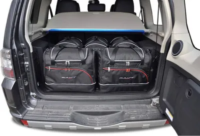 Zdjęcie produktu dla Torby do bagażnika MITSUBISHI PAJERO 5 2006-2017 5szt KJUST