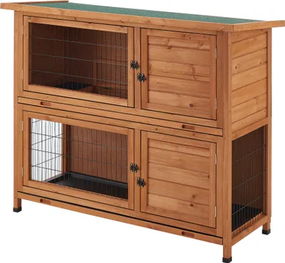 A two-tiered wooden hutch for small animals, such as rabbits or guinea pigs, is shown against a white background.