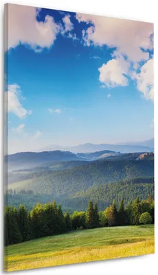 Produktbild von Wallario Premium Leinwandbild Berglandschaft im Gebirge unter blauem Himmel in Größe 60 x 90 cm