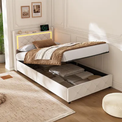 A bed with storage is shown in a bedroom setting.