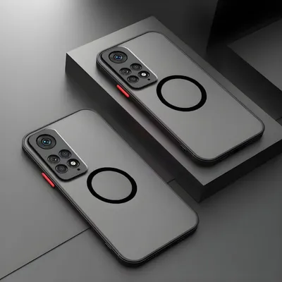 Two phone cases are displayed on a dark gray surface, with one case elevated on a dark gray block.