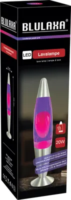 The image shows the retail packaging of a BLULAXA LED lava lamp. The packaging is predominantly black with colorful branding and product imagery. A lava lamp with purple liquid and pink blobs is displayed on the front.