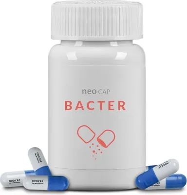A white bottle of Neo Cap Bacter supplements with several capsules scattered around its base.