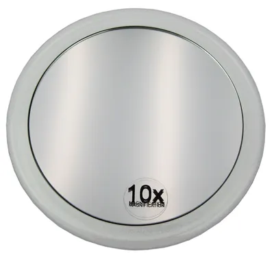 A round magnifying mirror with a white rim, shown from a top-down perspective against a white background.