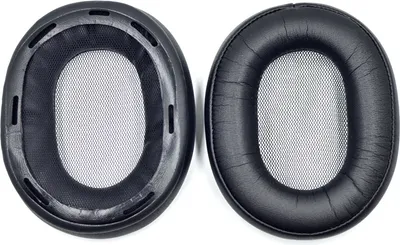 Two black ear pads for headphones are shown side-by-side against a white background.
