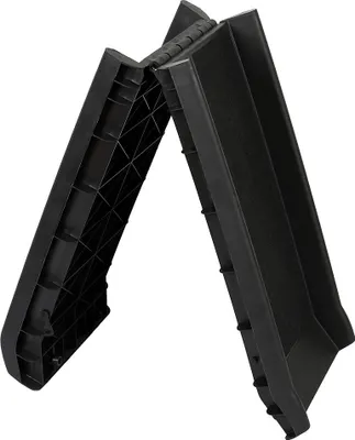 A black foldable dog ramp is shown against a white background.