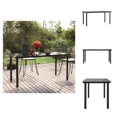 A dining table set up on a wooden deck outdoors, with trees and foliage in the background.