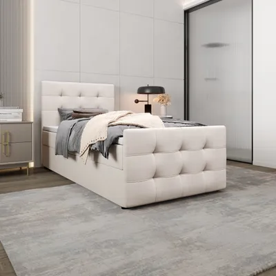A bedroom scene with a bed, nightstand, and lamp.