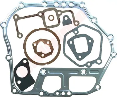 A set of engine gaskets laid out on a white background.