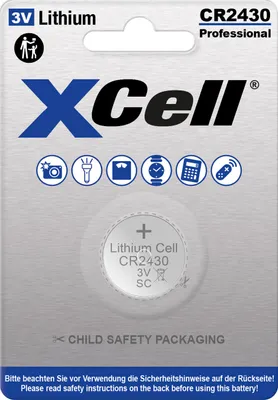 The image shows the retail packaging of a button cell battery.